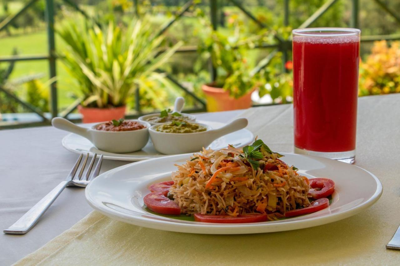 Amritara Ambatty Greens Resort Virajpet Extérieur photo