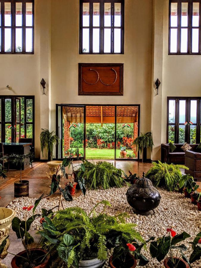 Amritara Ambatty Greens Resort Virajpet Extérieur photo